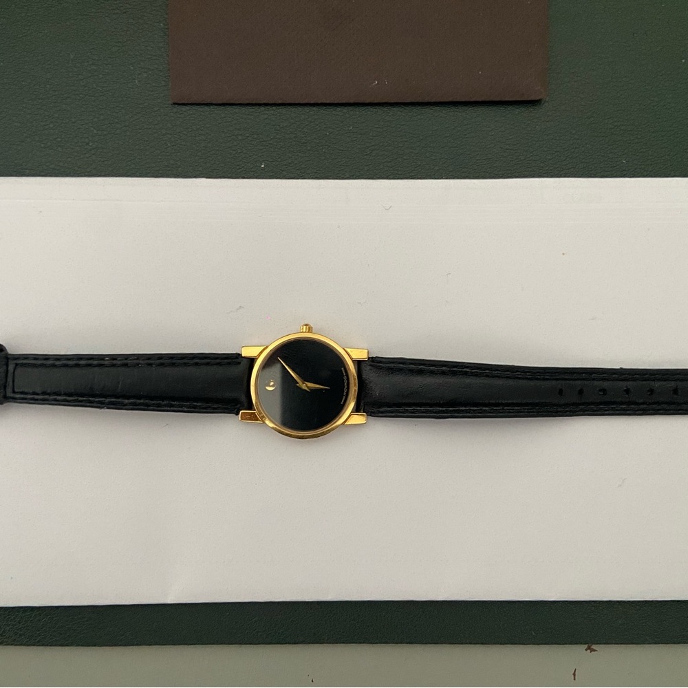 Movado Gold and Black women Watch